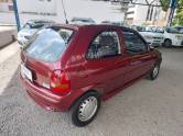 CHEVROLET - CORSA - 1997/1998 - Vinho - R$ 14.800,00